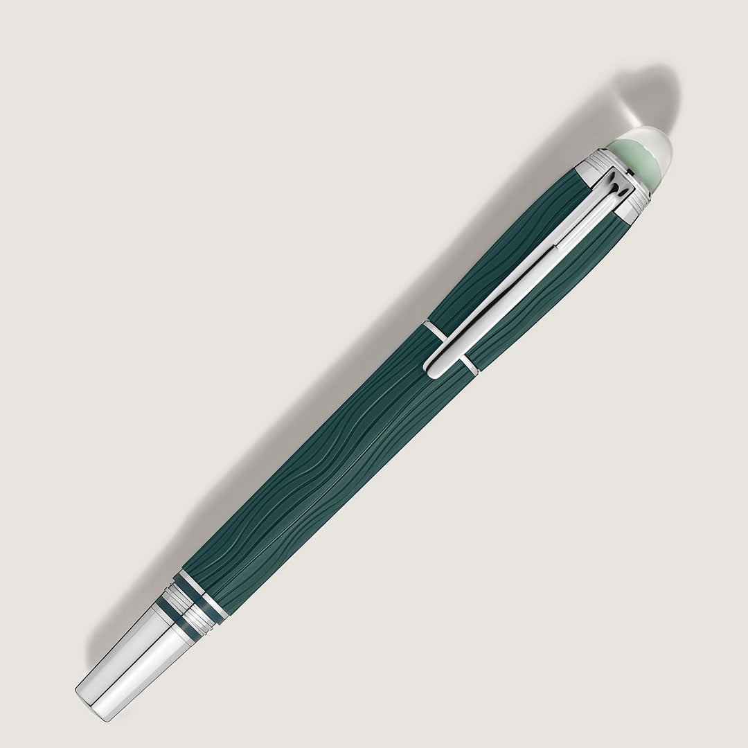 The Montblanc Starwalker Polar Green Precious Resin Fineliner Pen features a textured green and silver barrel, silver clip, and pale green tip, shown diagonally on a light background with a soft shadow.
