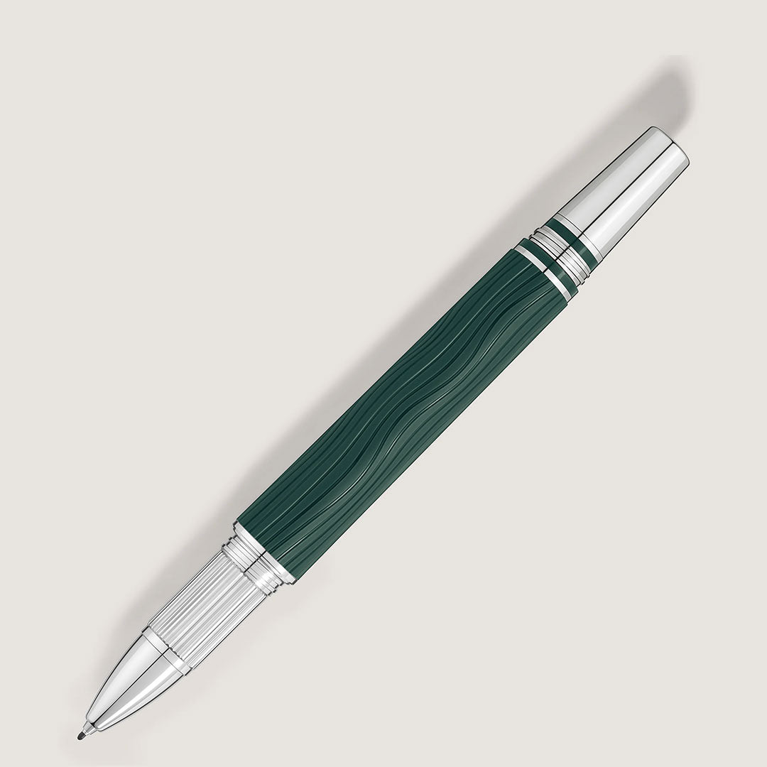 The Montblanc Starwalker Polar Green Precious Resin Fineliner Pen features a wavy green barrel and platinum accents on the cap, clip, and tip, shown diagonally on a light background.