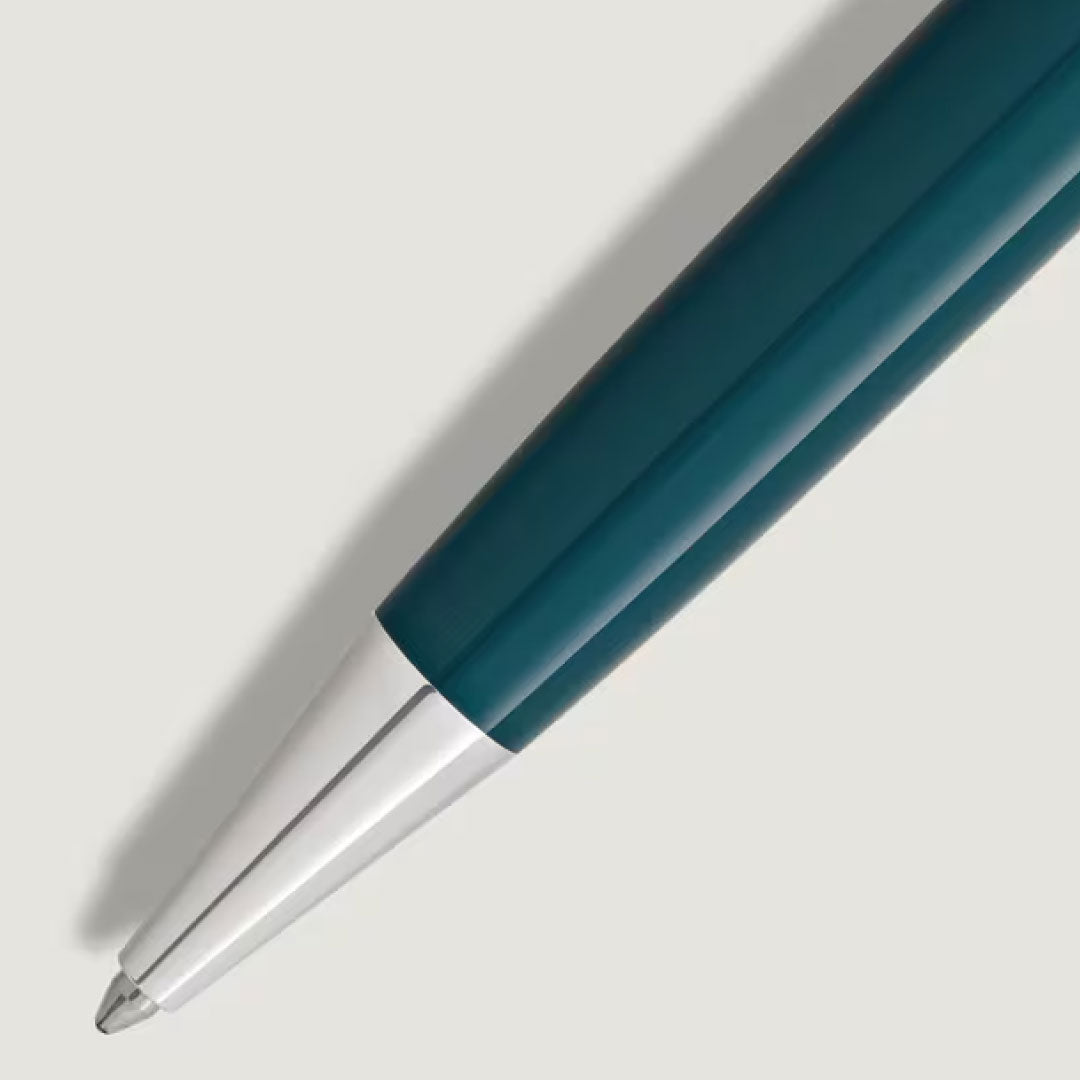 Close-up of the Montblanc Meisterstuck Romeo & Juliet LeGrand Rollerball Pen, featuring a teal body and metallic silver tip, set against a plain light grey background.