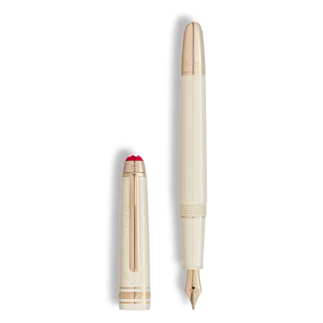 The Montblanc Meisterstück Romeo & Juliet Classique Fountain Pen, crafted from cream precious resin with gold accents and a red-tipped cap, is shown uncapped with the Montblanc cap placed beside the pen.