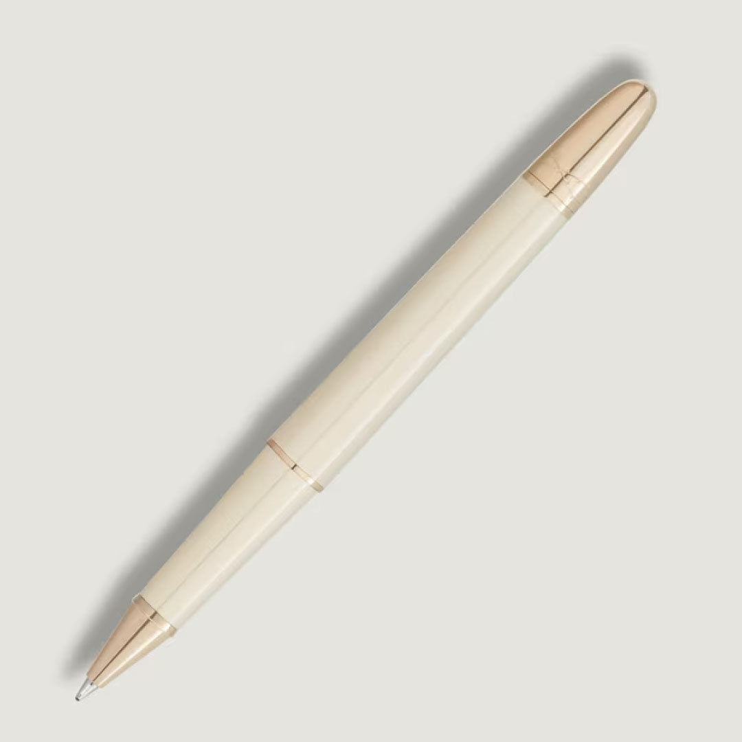The Montblanc Meisterstück Romeo & Juliet Classique Rollerball Pen features a cream-colored precious resin body with gold accents on the tip, middle ring, and clip, shown against a light gray background.