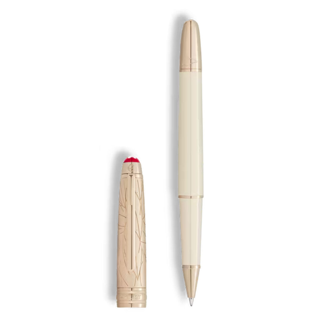 The Montblanc Meisterstück Romeo & Juliet Doue Classique Rollerball Pen features a cream and gold finish with a shiny decorative cap, engraved patterns, and a red top, displayed side by side on a white background.