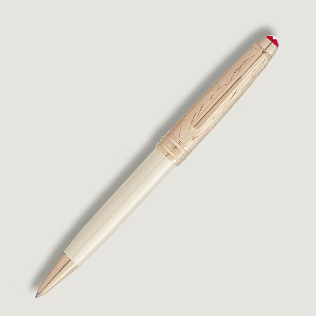 The Montblanc Meisterstuck Romeo & Juliet Doue Classique Ballpoint Pen features a cream barrel, gold-toned engraved cap and tip, and a red accent at the end, shown on a light gray background.