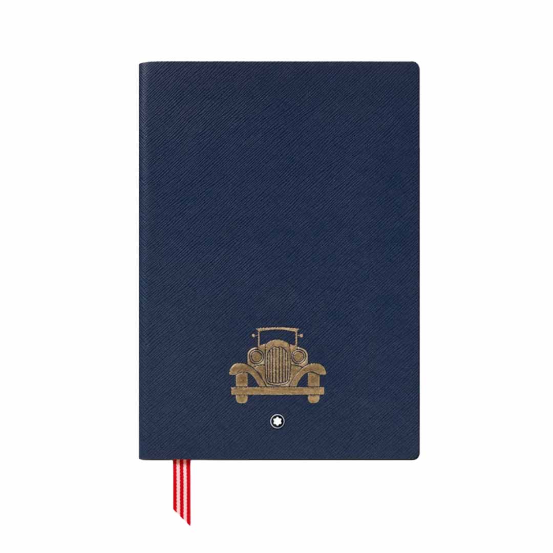 The Montblanc Great Characters Homage to the Great Gatsby #146 Blue Lined Notebook captivates with its navy blue leather cover, adorned with a gold-embossed vintage car design that reflects the elegance of the Great Gatsby collection. It includes a red ribbon bookmark, set against a simple white background.