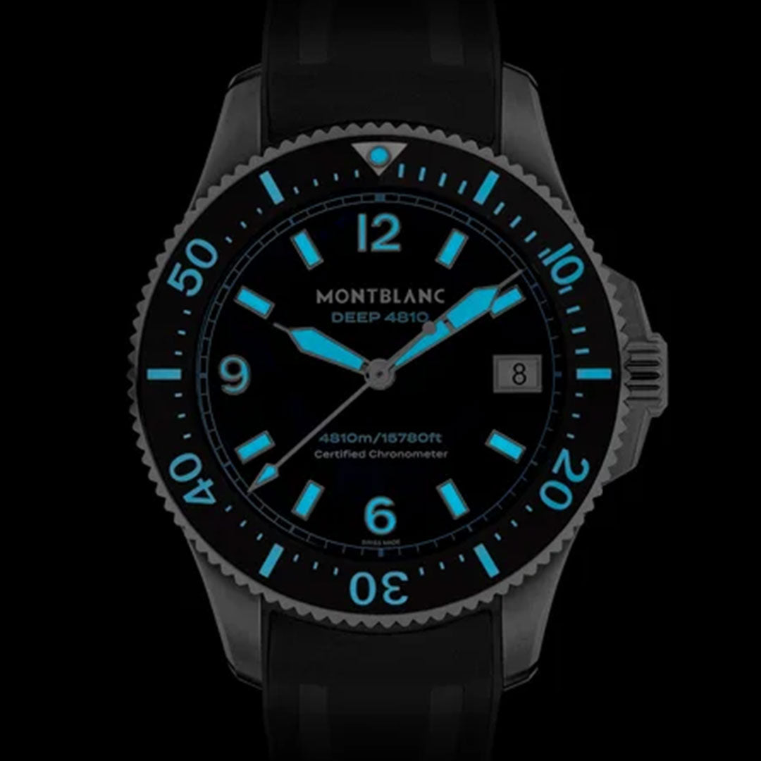 The Montblanc Iced Sea 0 Oxygen Automatic 43mm Watch is a dark-themed diving timepiece featuring luminous blue hands and hour markers. It includes a rotating bezel, a glacier pattern dial, a date display at the 3 o'clock position, and is marked with the "4810m/15780ft Certified Chronometer" text on the dial.