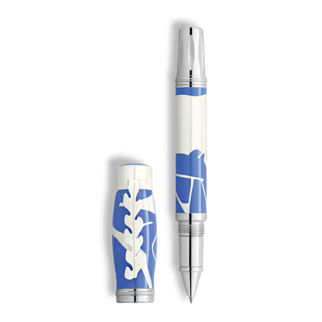 The Montblanc Masters of Art Homage to Henri Matisse Limited Edition 4810 Rollerball Pen features white and blue hues, silver accents, and abstract leaf and branch designs inspired by the elegance of Montblanc’s art collection.