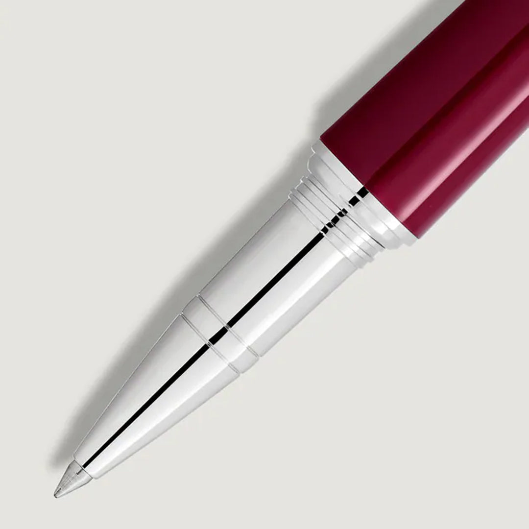 Close-up of the tip of the Montblanc Maria Callas Special Edition Rollerball Pen, shown diagonally on a light gray background—a tribute to operatic elegance by Montblanc.