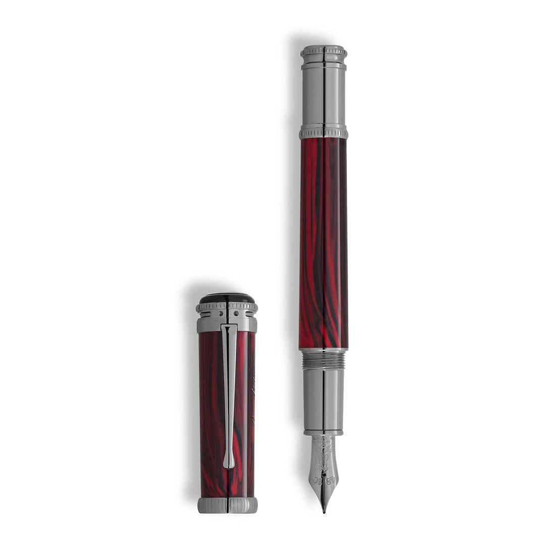 The Montblanc Writers Edition Homage to Bram Stoker Limited Edition Fountain Pen features a red marbled barrel with silver accents, shown uncapped and upright to display its metal nib and the cap's clip.