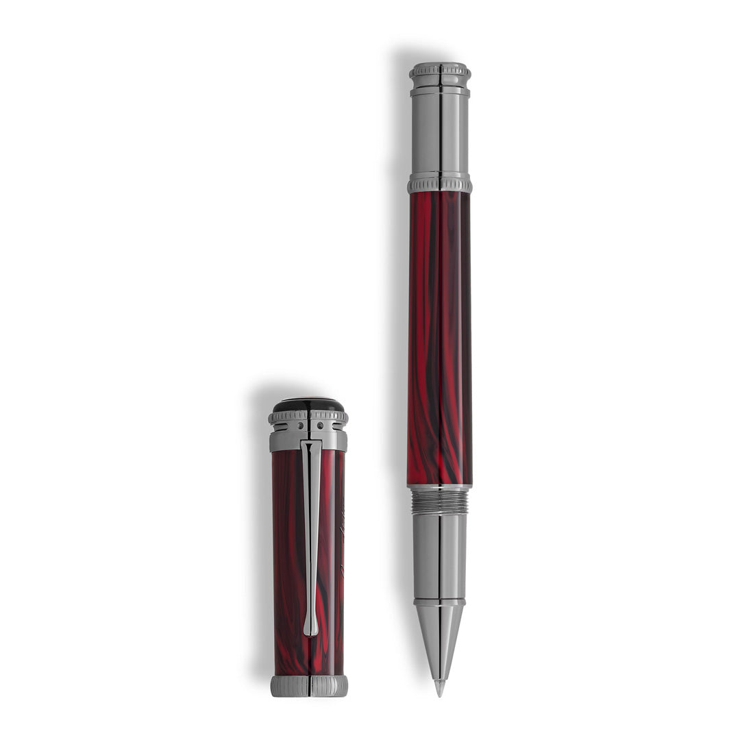The Montblanc Writers Edition Homage to Bram Stoker Limited Edition Rollerball Pen features a shiny silver cap and tip with a marbled deep red barrel. The cap stands upright beside the pen against a white background.