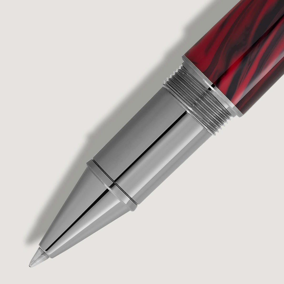Close-up of the Montblanc Writers Edition Homage to Bram Stoker Limited Edition Rollerball Pen, featuring a silver tip and red-black marbled barrel, set against a light gray background.