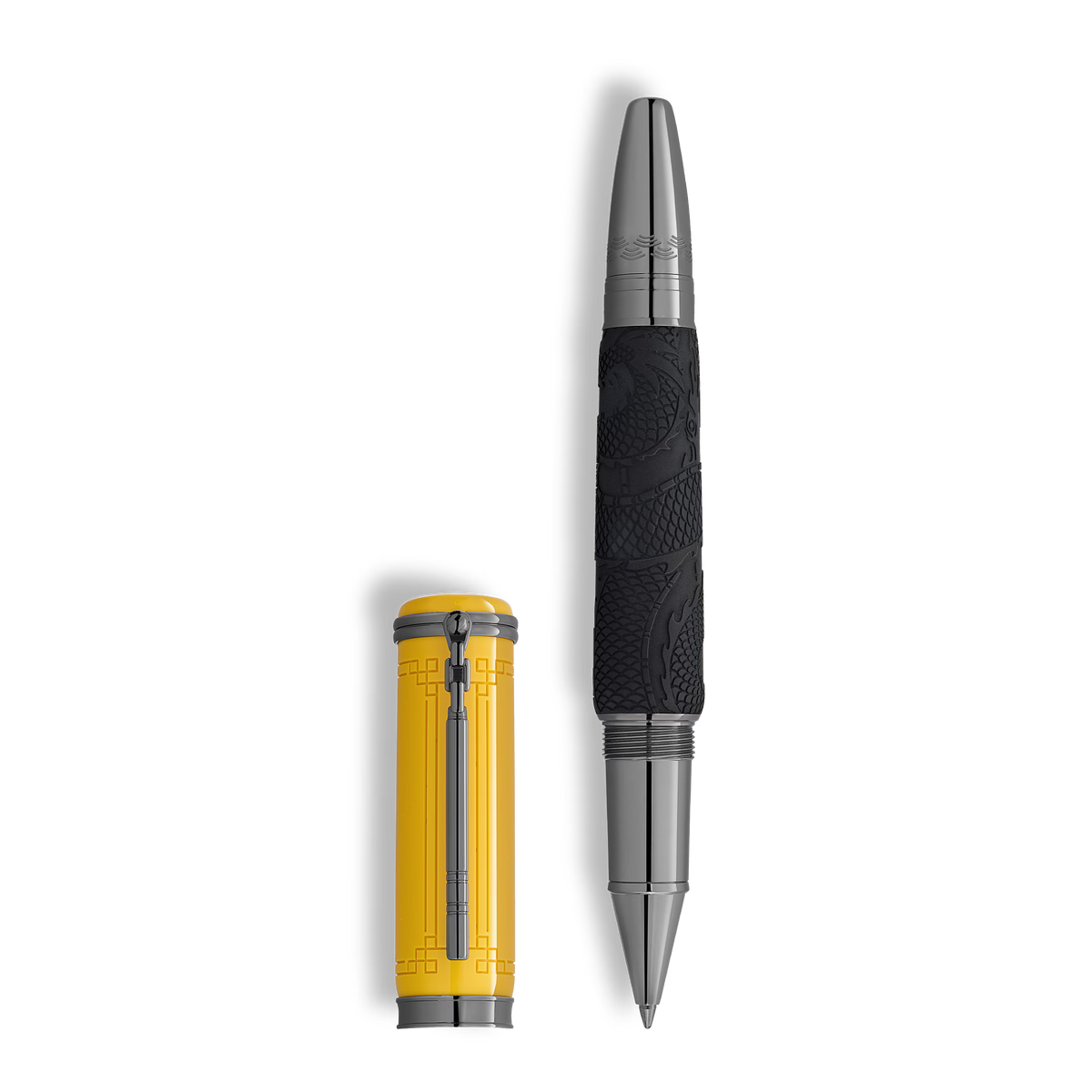 Montblanc Great Characters Bruce Lee Special Edition Rollerball Pen with a yellow cap featuring geometric patterns and a black, textured barrel with a subtle dragon motif.