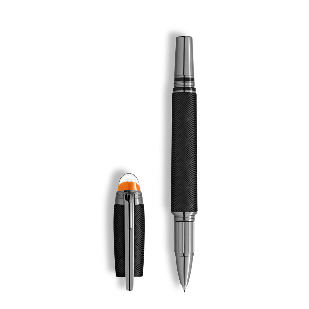 The Montblanc StarWalker Extreme Precious Resin Fineliner Pen stands upright beside its matching cap, both in black and silver with a textured grip, ruthenium-coated fittings, a silver clip, and an orange accent, set against a white background.