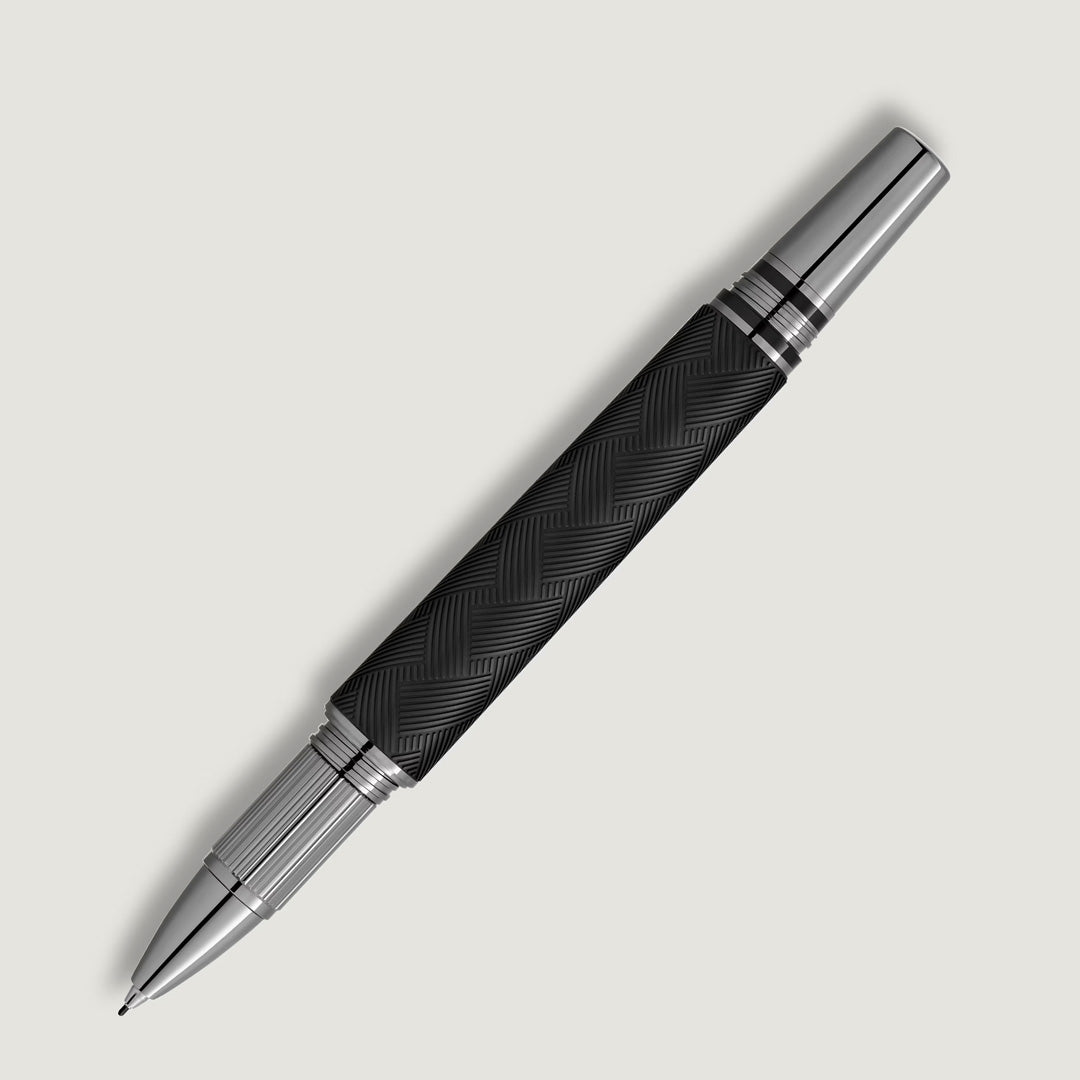 The Montblanc StarWalker Extreme Precious Resin Fineliner Pen, in black and silver with a textured grip and shiny ruthenium-coated fittings, is placed diagonally on a plain white background.
