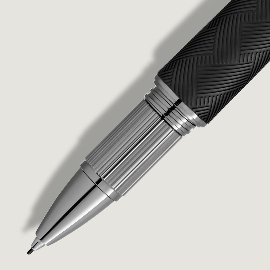 A close-up of the Montblanc StarWalker Extreme Doue Fineliner Pen, a luxury black and silver writing instrument by Montblanc with a textured grip and shiny ruthenium-coated tip, set against a light gray background.