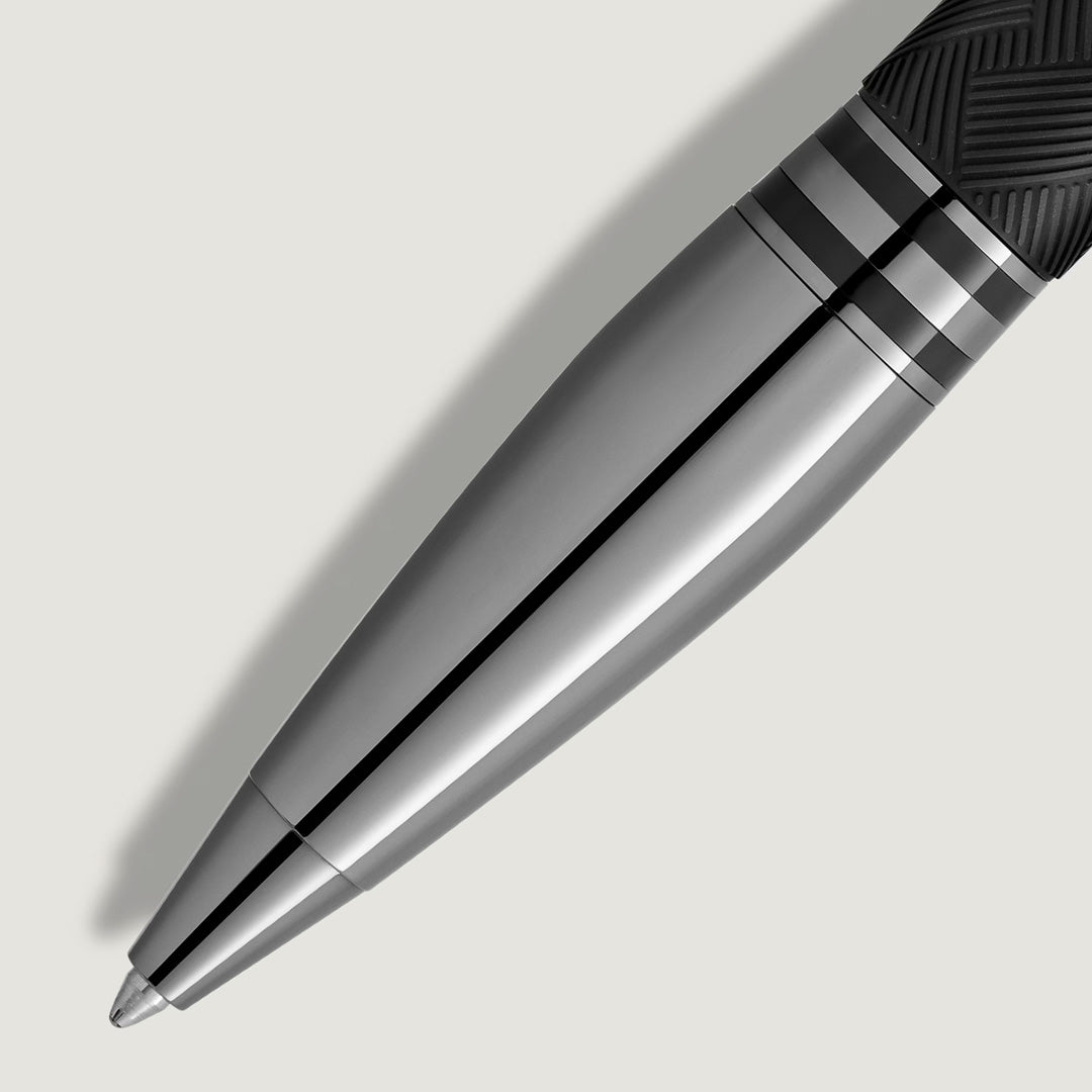 A close-up of the Montblanc StarWalker Extreme Doue Ballpoint Pen, featuring a sleek silver body with a black grip and two narrow black lines, highlights Montblanc’s refined style and ruthenium-coated finish against a light grey background.