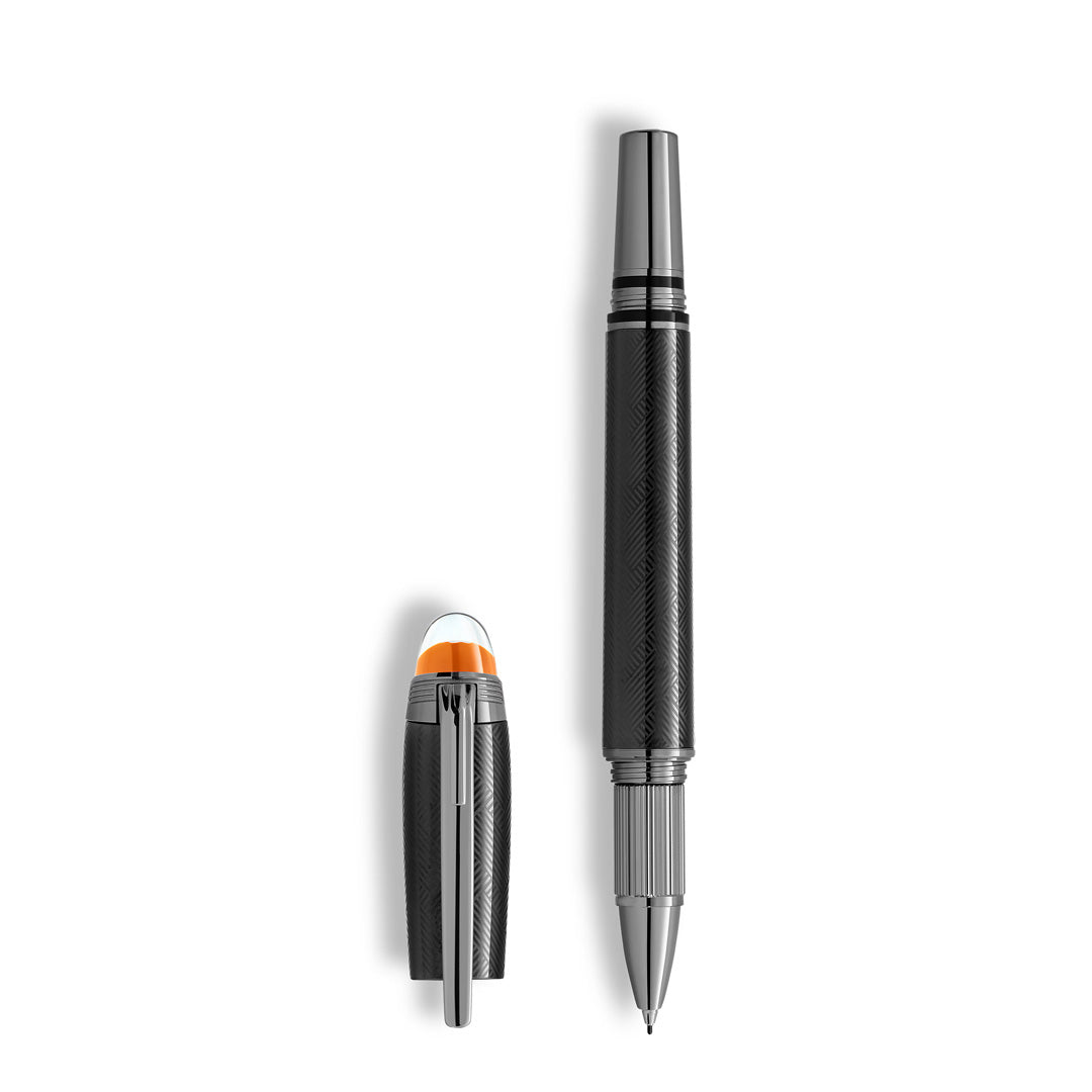 A Montblanc StarWalker Extreme Metal Fineliner Pen with a textured black finish and silver accents is shown uncapped, its cap standing upright beside it, emphasizing the modern luxury design against a white background.