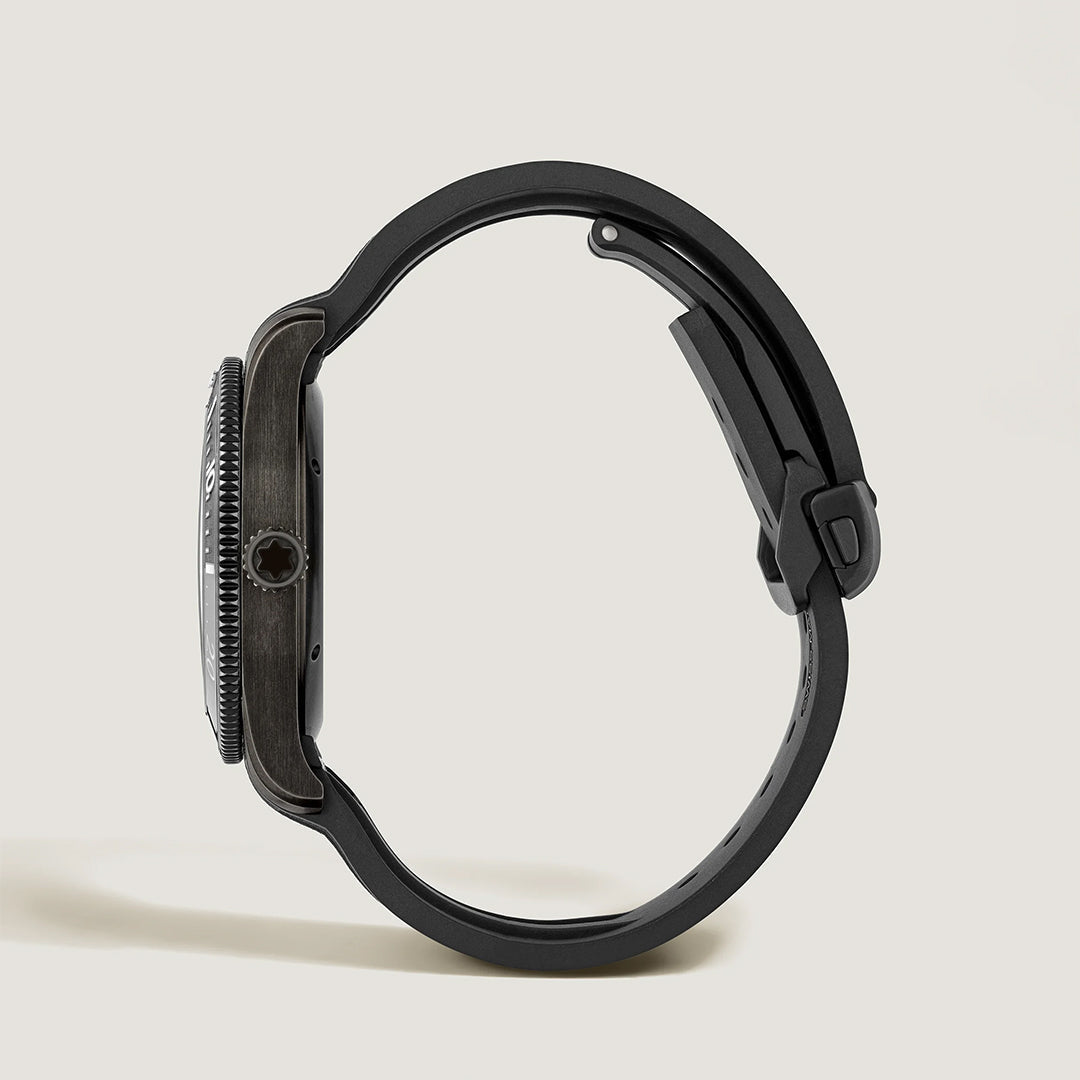 Side view of the Montblanc Iced Sea Automatic Date 0 Oxygen 41mm watch with a round case, textured bezel, and black strap set against a light background. The glacier pattern dial, crown, and buckle are distinctly visible.