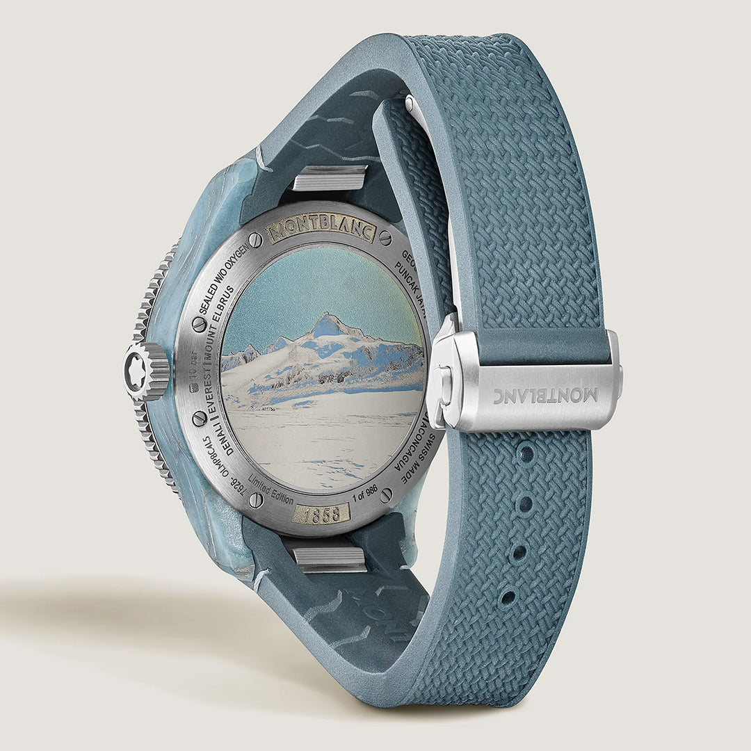 A close-up of the back of the Montblanc 1858 Geosphere 0 Oxygen Mount Vision Automatic 43.5mm Limited Edition watch with a blue strap, featuring a mountain landscape engraving inspired by Reinhold Messner on the caseback.