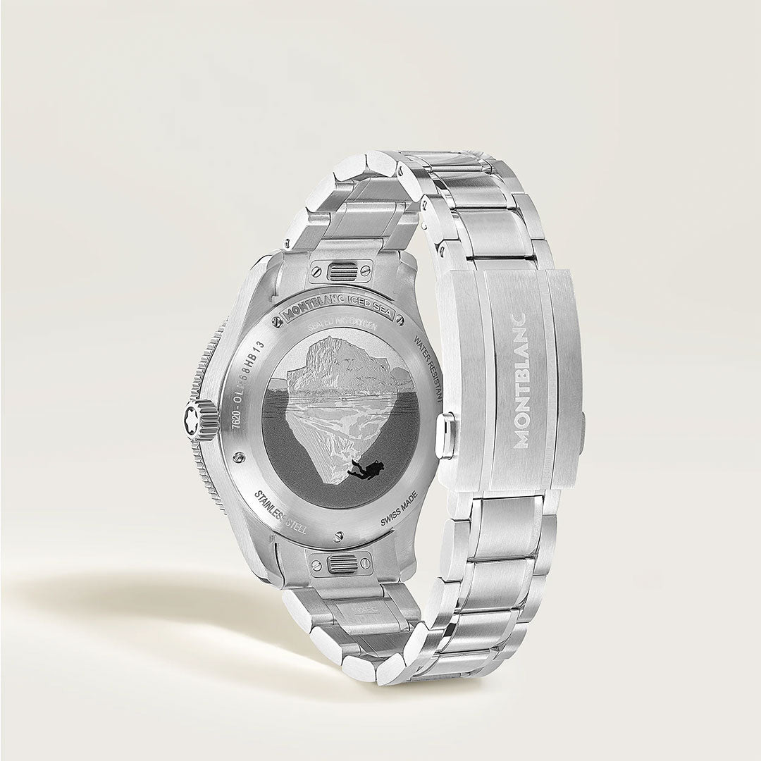 The Montblanc Iced Sea Automatic Date 0 Oxygen 38mm Watch is shown from the back, revealing an engraved mountain and climber on the case, with a stainless steel bracelet and "MONTBLANC" on the clasp.