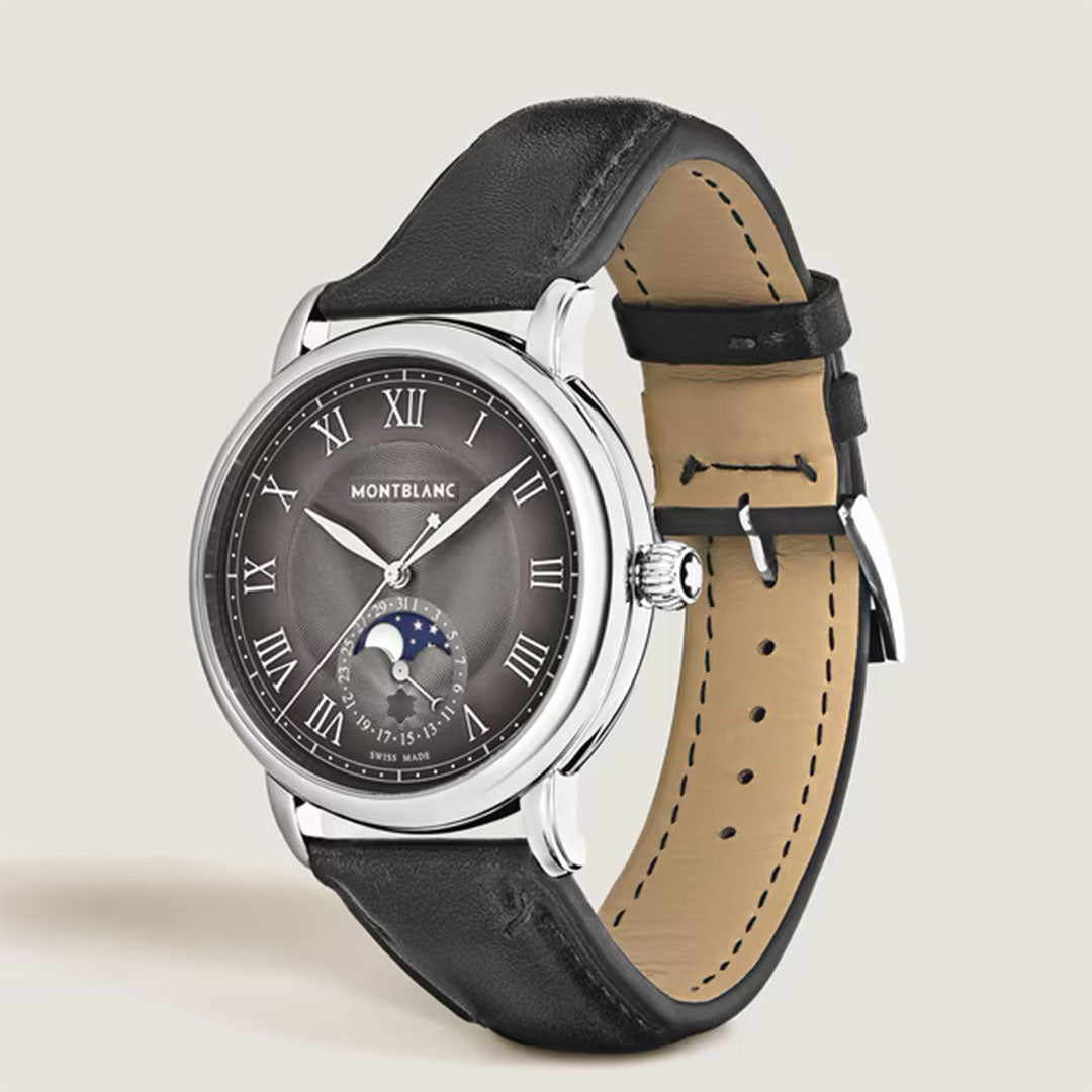 The Montblanc Star Legacy Moonphase Automatic 42mm Watch, featuring a black leather strap, silver case, anthracite dial with Roman numerals, and a moon phase display above 6 o’clock, is displayed on a light background.