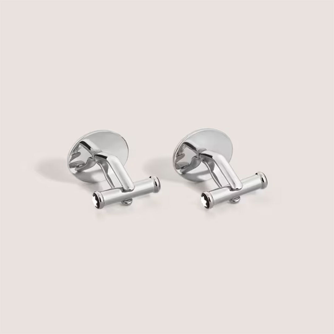 Montblanc Meisterstuck Black Lacquer Cufflinks by Montblanc, featuring a sleek cylindrical design, are elegantly displayed against a plain light background.