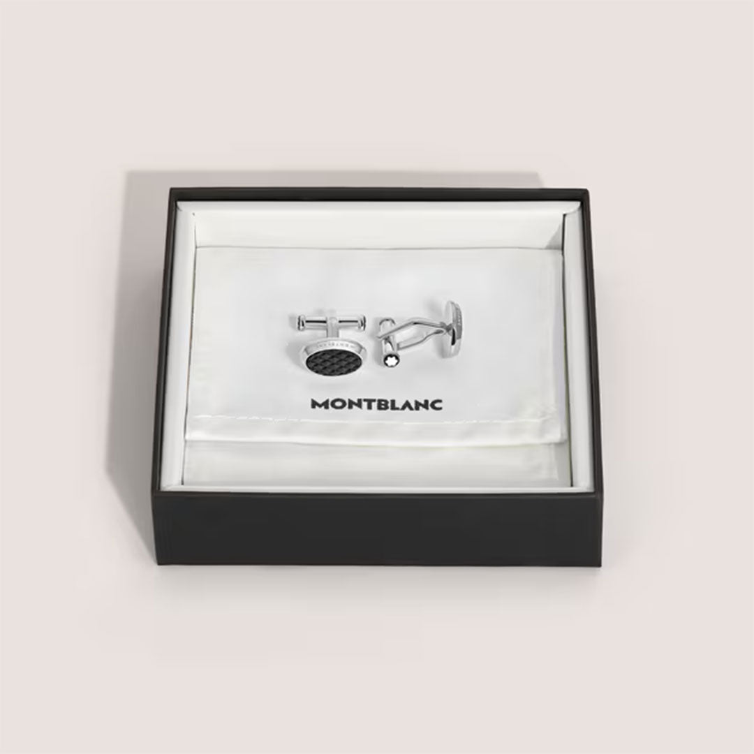 The Montblanc Meisterstuck Black Lacquer Cufflinks, featuring black lacquer inlays and silver-tone accents, are elegantly presented in a black box lined with white fabric and stamped with the Montblanc logo.
