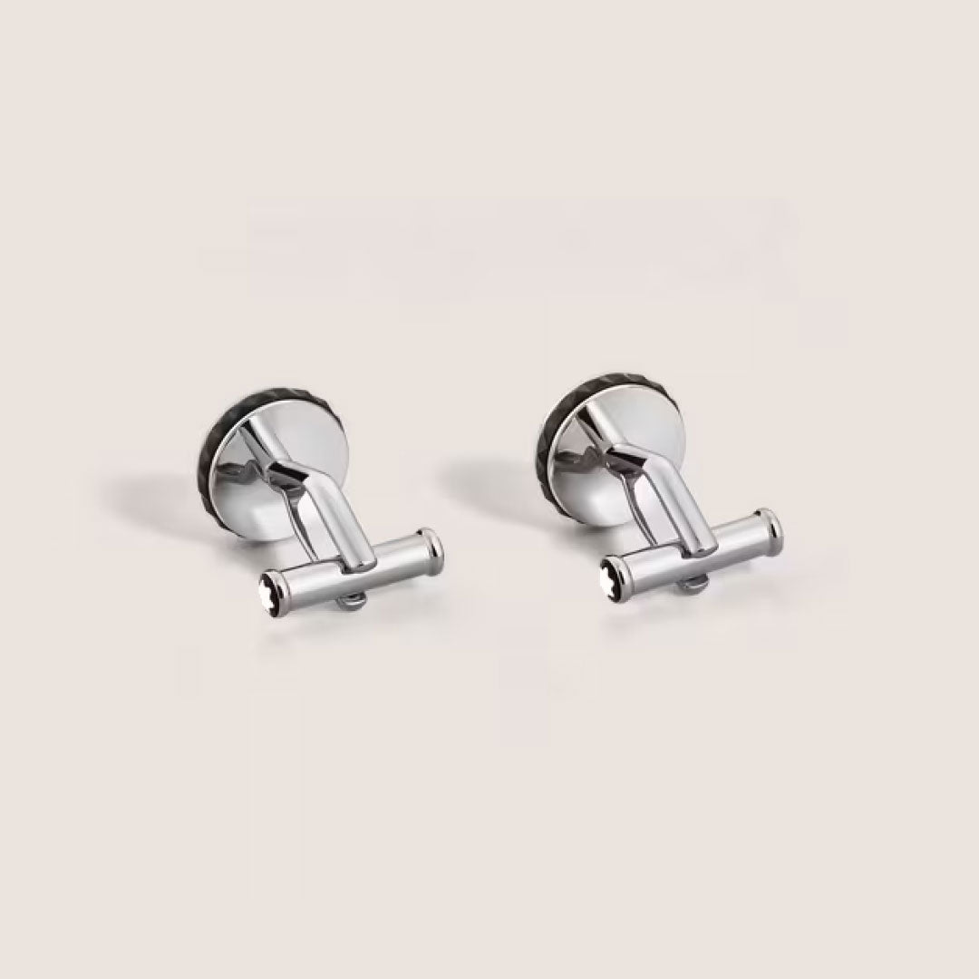 The Montblanc Great Characters Homage to Queen Cufflinks feature a shiny, silver-toned steel T-bar design—an elegant addition to the Montblanc collection.