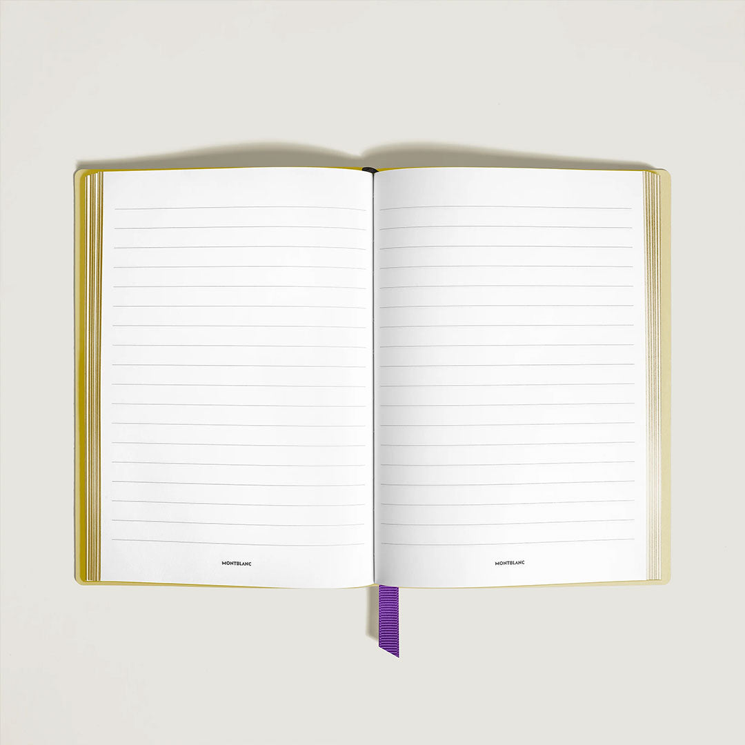 The Montblanc Masters of Art to Pierre-Auguste Renoir Multicolour Line Pages Medium Notebook features a yellow cover, purple ribbon bookmark, and blank pages. Made in Italy by Montblanc, it measures 150 x 210 mm—perfect for your notes and ideas.
