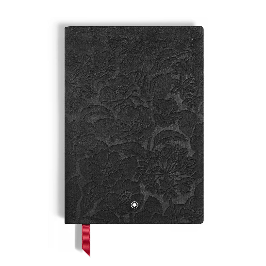 The Montblanc Writers Edition Homage to Bram Stoker Medium Leather Notebook features a black embossed floral cover, red ribbon bookmark, and is displayed on a white background.