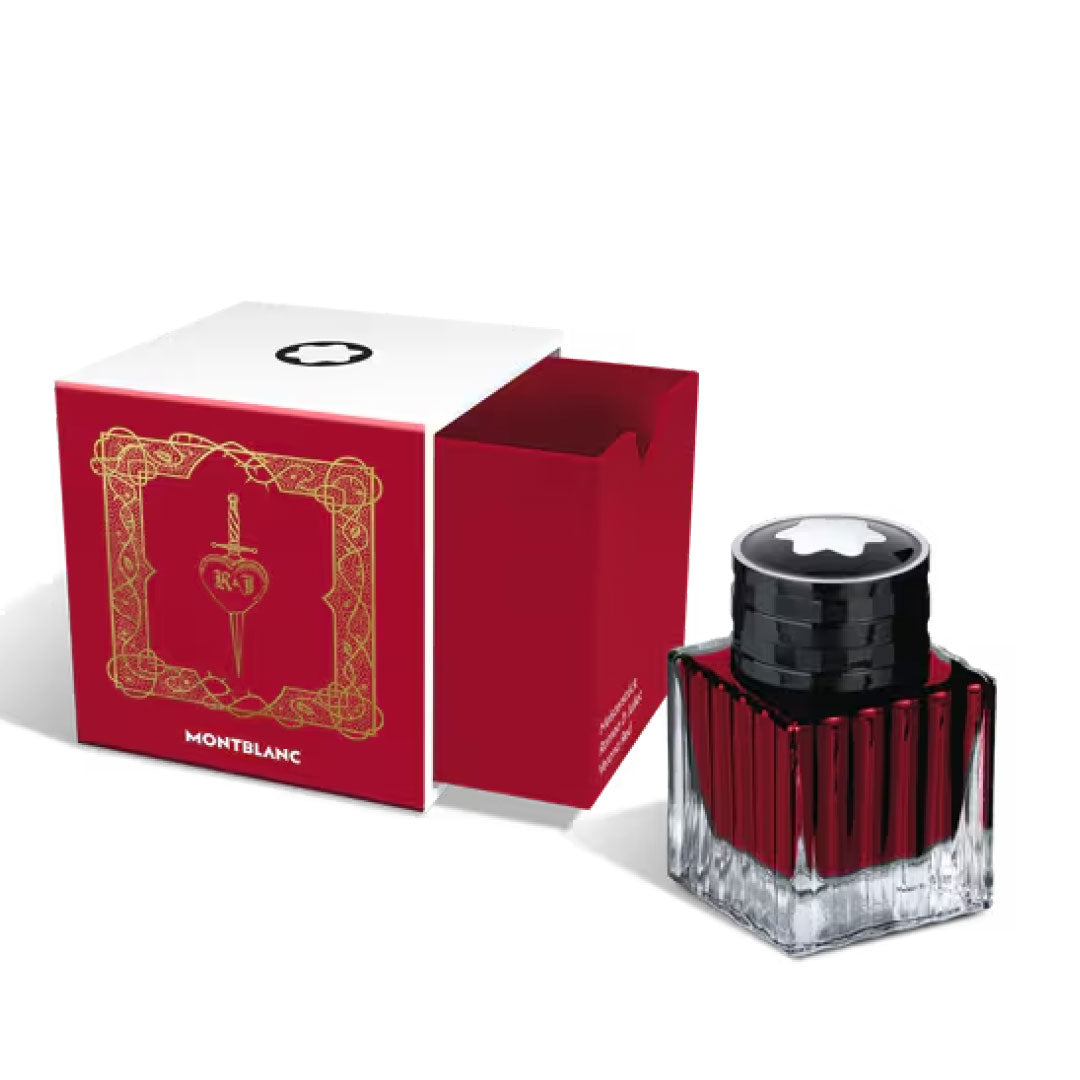 A Montblanc Ink Bottle 50ml Verona Red, Meisterstuck Romeo & Juliet sits beside its red and white Special Edition box featuring gold decorative designs and the Montblanc logo.