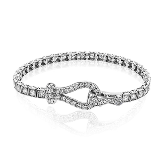 The Simon G. 18K White Gold Diamond Buckle Bracelet by Simon G features square links and a prominent buckle clasp adorned with small, sparkling white diamonds arranged in a neat circle, boasting a polished, shiny finish.