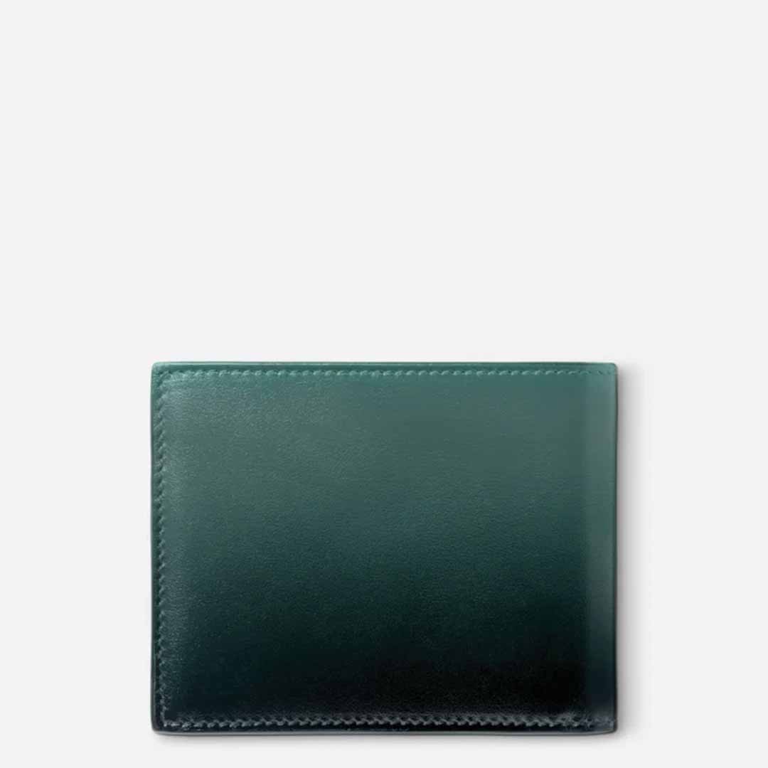 Set against a light gray background, a closed Montblanc Meisterstück 6cc Leather Wallet in premium British green leather showcases its smooth texture and visible stitched edges.
