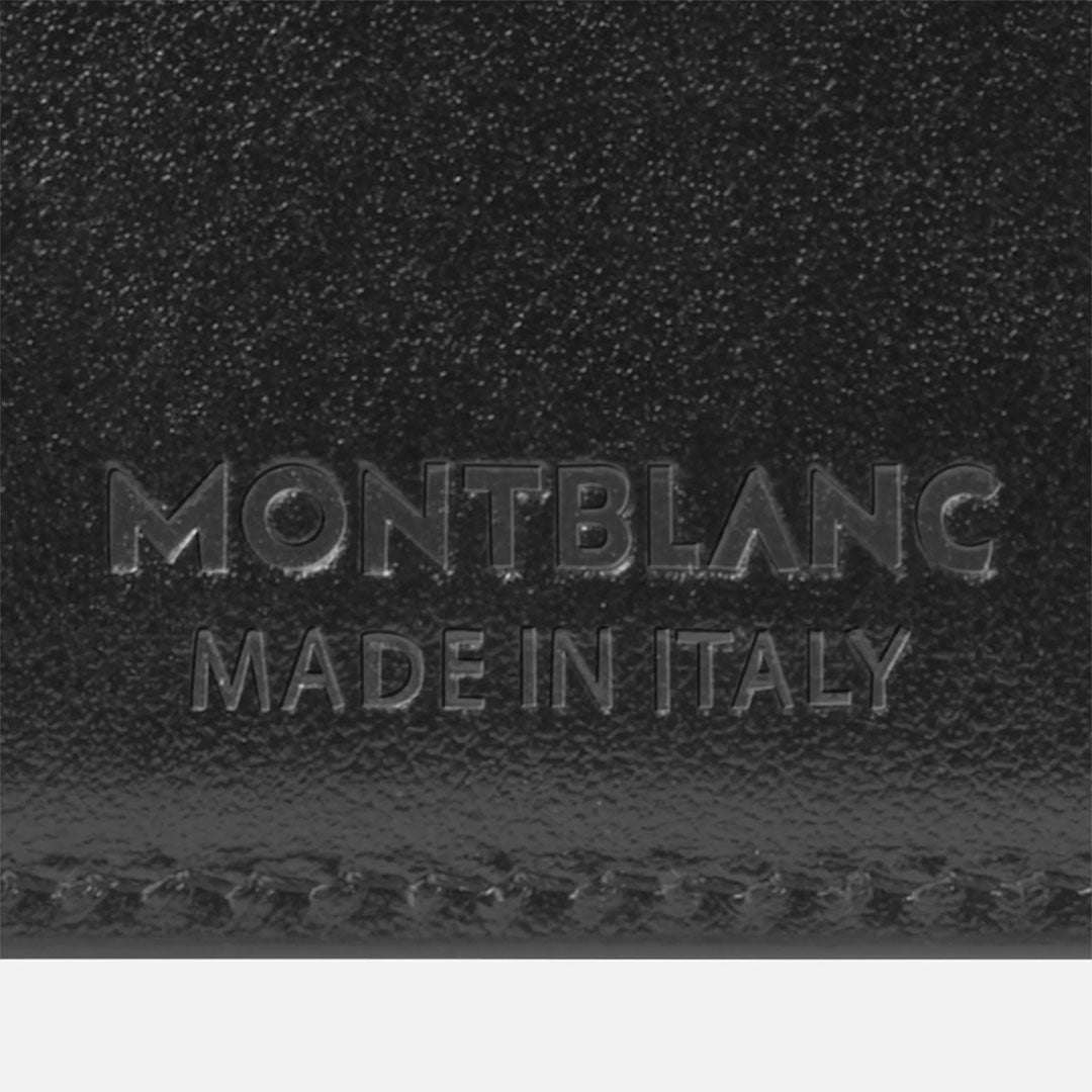Close-up of the Montblanc Meisterstuck 6CC Leather Wallet in black, showing "MONTBLANC MADE IN ITALY" embossed and detailed stitching at the bottom.