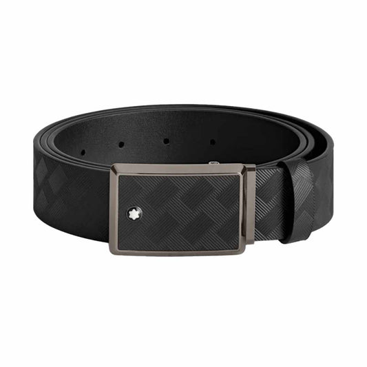The Montblanc 35mm Leather Belt, crafted by Montblanc, features a black leather design with a textured checkered pattern and a rectangular metallic buckle adorned with a shiny ruthenium finish, coiled in a circular shape.