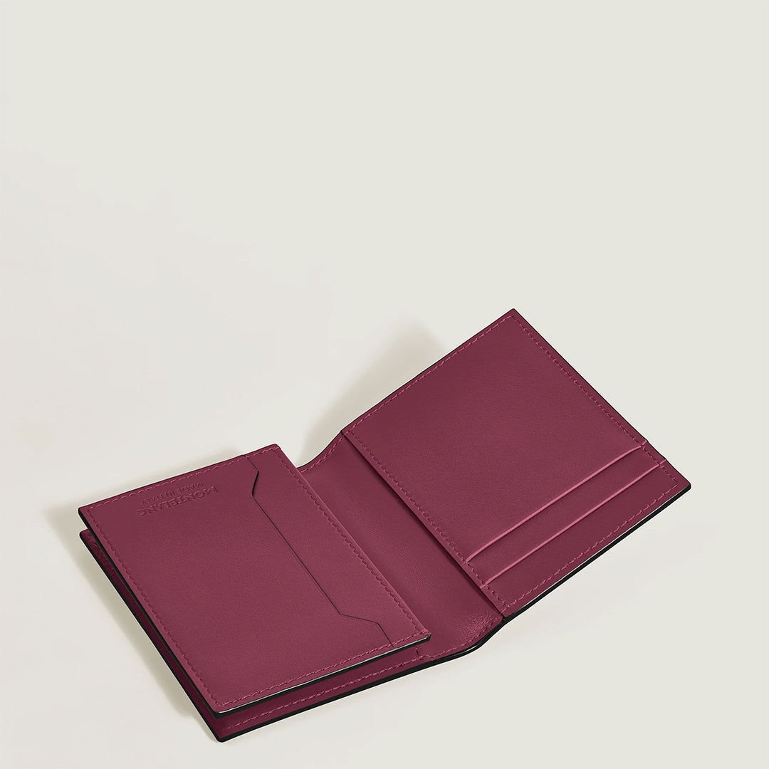 A burgundy Montblanc Meisterstuck 4CC Card Holder, designed for organizing business cards with multiple slots, is shown on a light-colored background.