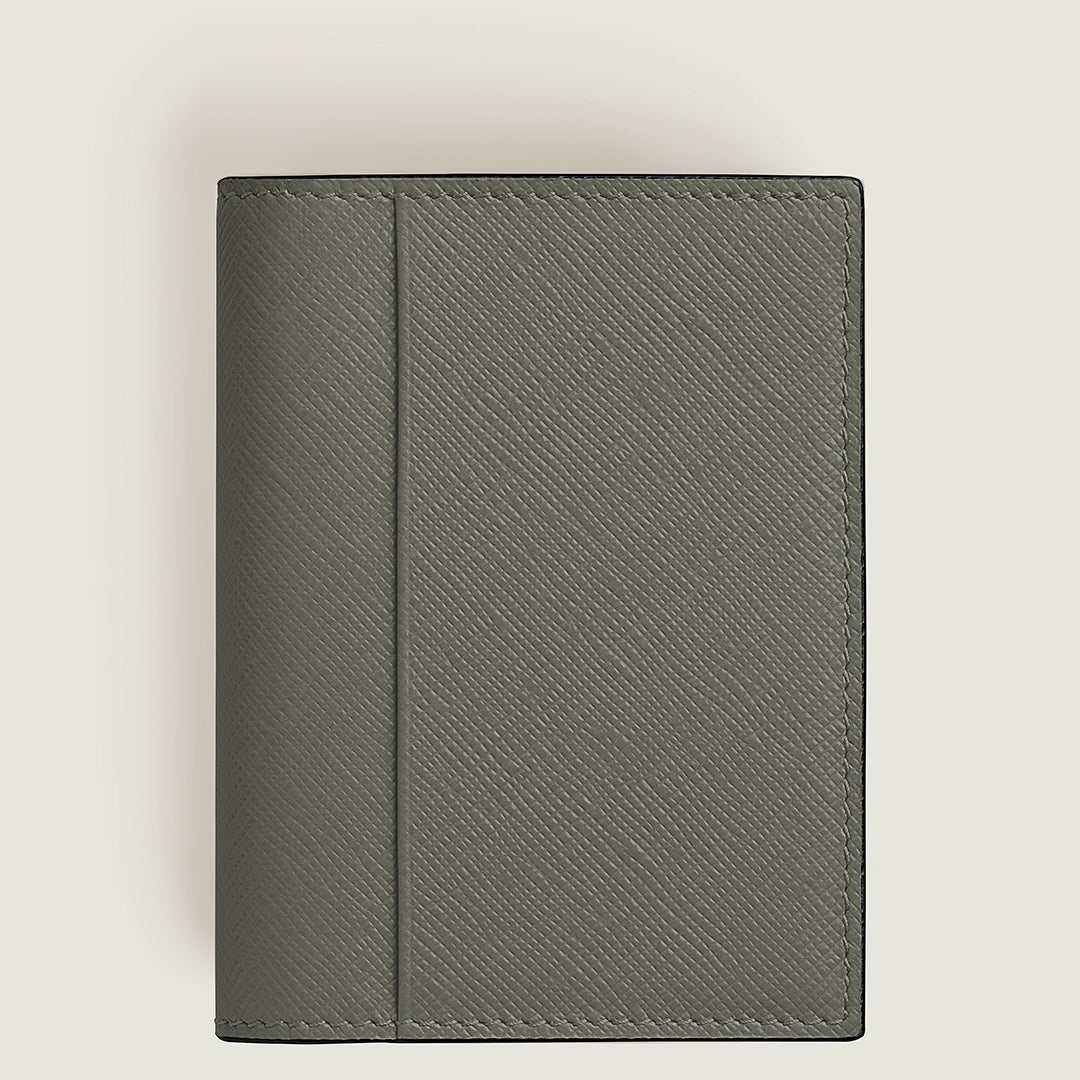 The Montblanc Sartorial 4CC Leather Card Holder, in textured olive green Saffiano leather with a minimalist design and multiple card slots, is shown closed against a light, neutral background.