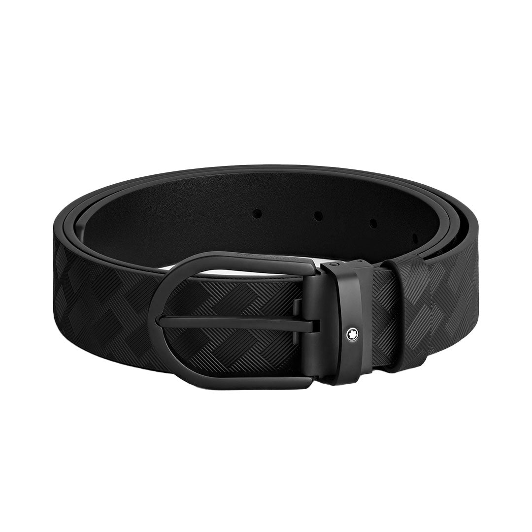 The Montblanc 35mm Black Leather Belt, crafted from calf-skin with a matte black buckle and crisscross embossing, is rolled up neatly against a white background.