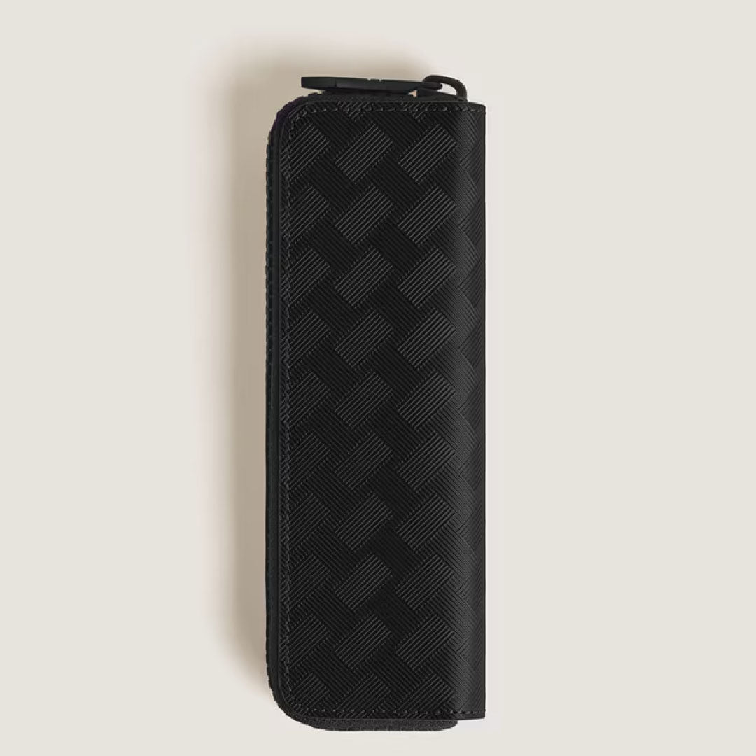 The Montblanc Extreme 3.0 Black Leather Single Pen Pouch features a zip closure and textured checkered pattern, shown vertically on a light beige background. Ideal for holding your Meisterstück Classique pen.