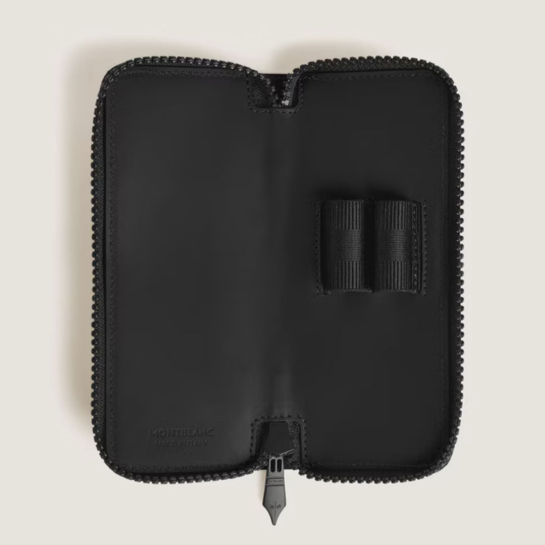 The Montblanc Extreme 3.0 Black Leather Double Pen Pouch features two elastic loops inside and embossed "MONTBLANC" and "MADE IN ITALY" in the corner. This black Montblanc pouch is shown open against an off-white background.