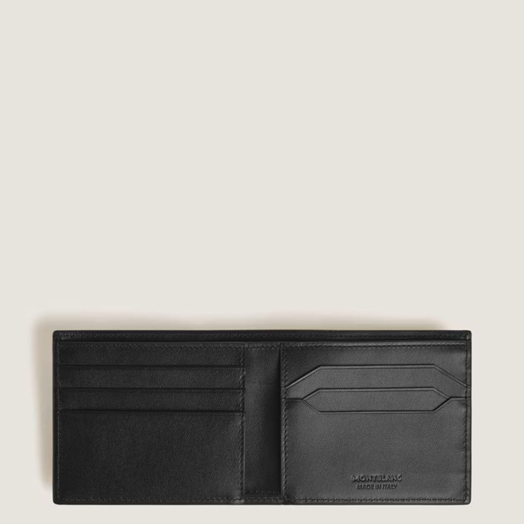 The Montblanc Extreme 3.0 6CC Leather Wallet is open, showing card slots and compartments. Crafted in black leather by Montblanc, it features “Montblanc Made in Italy” inside, set against a plain light beige background.