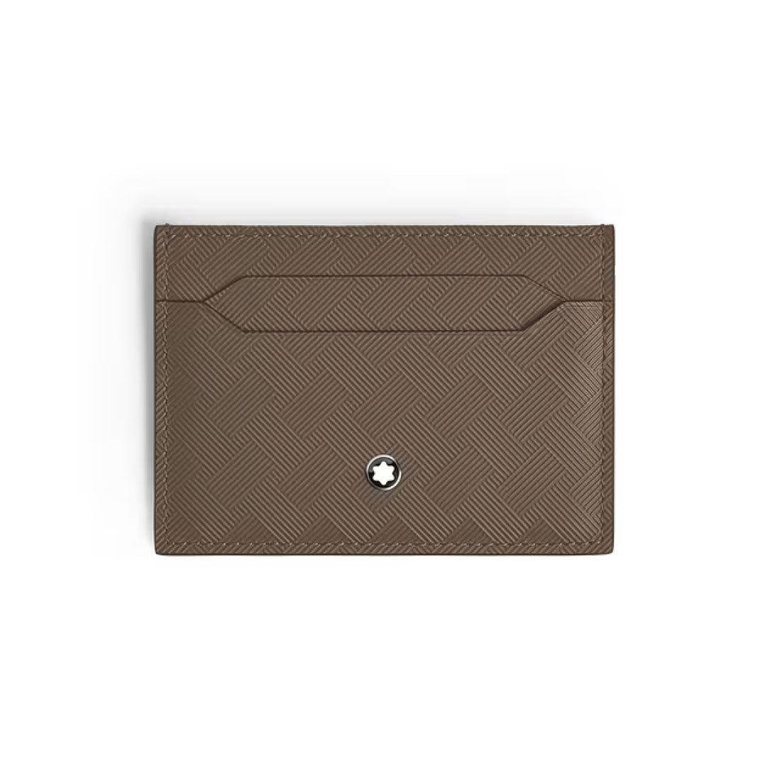 The Montblanc Extreme 3.0 5cc Leather Card Holder features brown textured noisette leather, a geometric motif, a single card slot, and is finished with a small white star emblem near the bottom center.