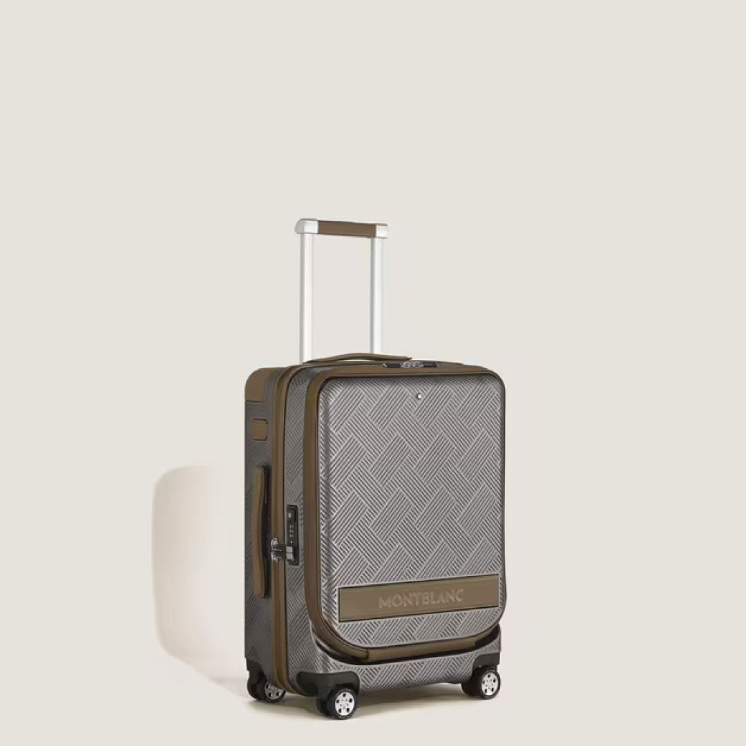 The Montblanc Extreme 3.0 Cabin Luggage with Pocket, featuring a geometric polycarbonate exterior, four wheels, TSA lock, telescopic handle, and brown accents, is displayed against a plain light background.