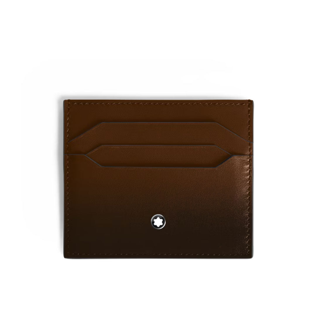 The Montblanc Meisterstück 6CC Leather Card Holder features Sfumato Brown leather, two card slots, and a signature small round white emblem near the bottom, all crafted by Montblanc and displayed against a plain white background.