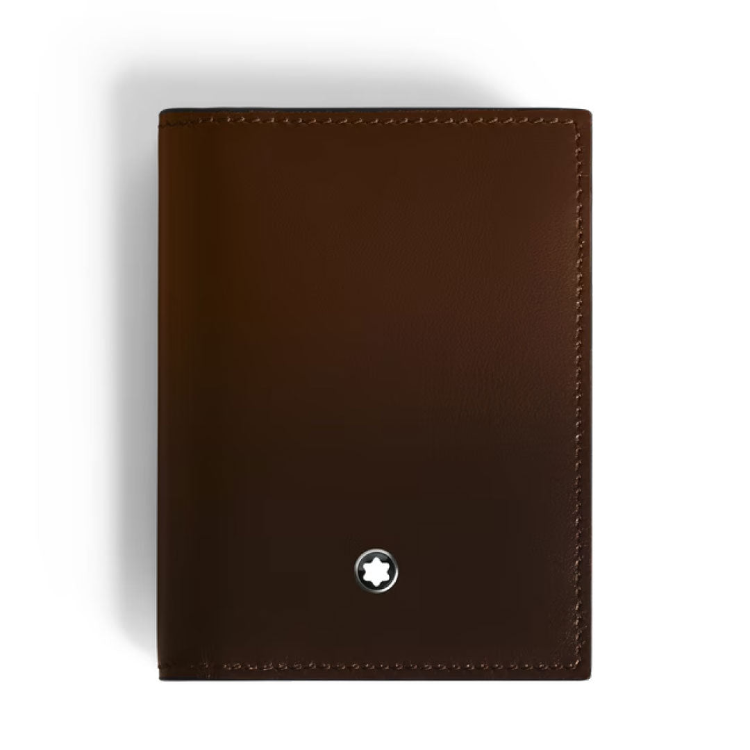 The Montblanc Meisterstück 4cc Brown Sfumato Leather Card Holder features neat stitching and a round silver Montblanc emblem centered near the bottom, shown closed from above on a white background.