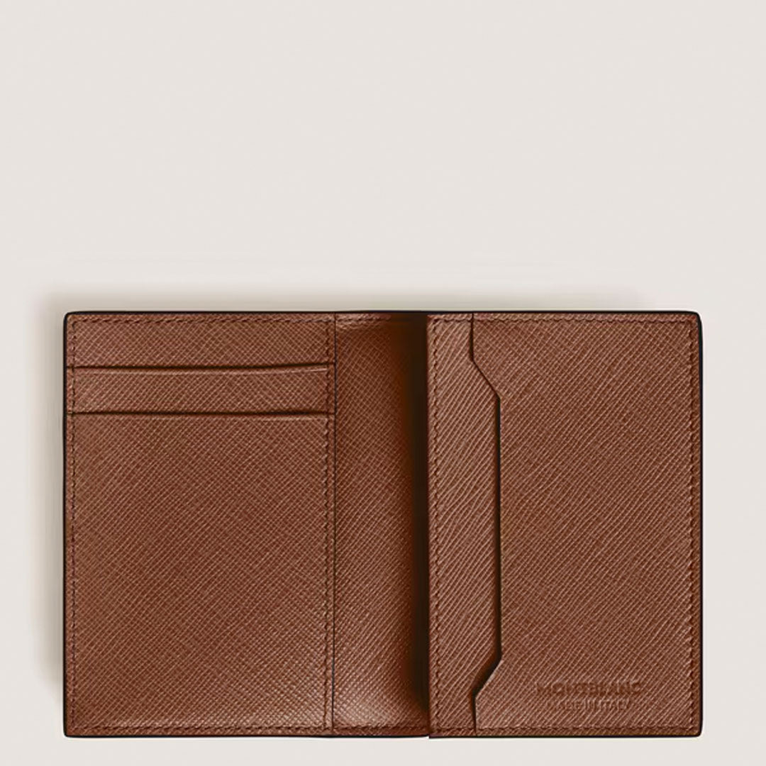 The Montblanc Sartorial 4CC Leather Card Holder by Montblanc features three card slots on the left, an angled pocket on the right, textured brown leather, and discreet branding embossed at the bottom right.