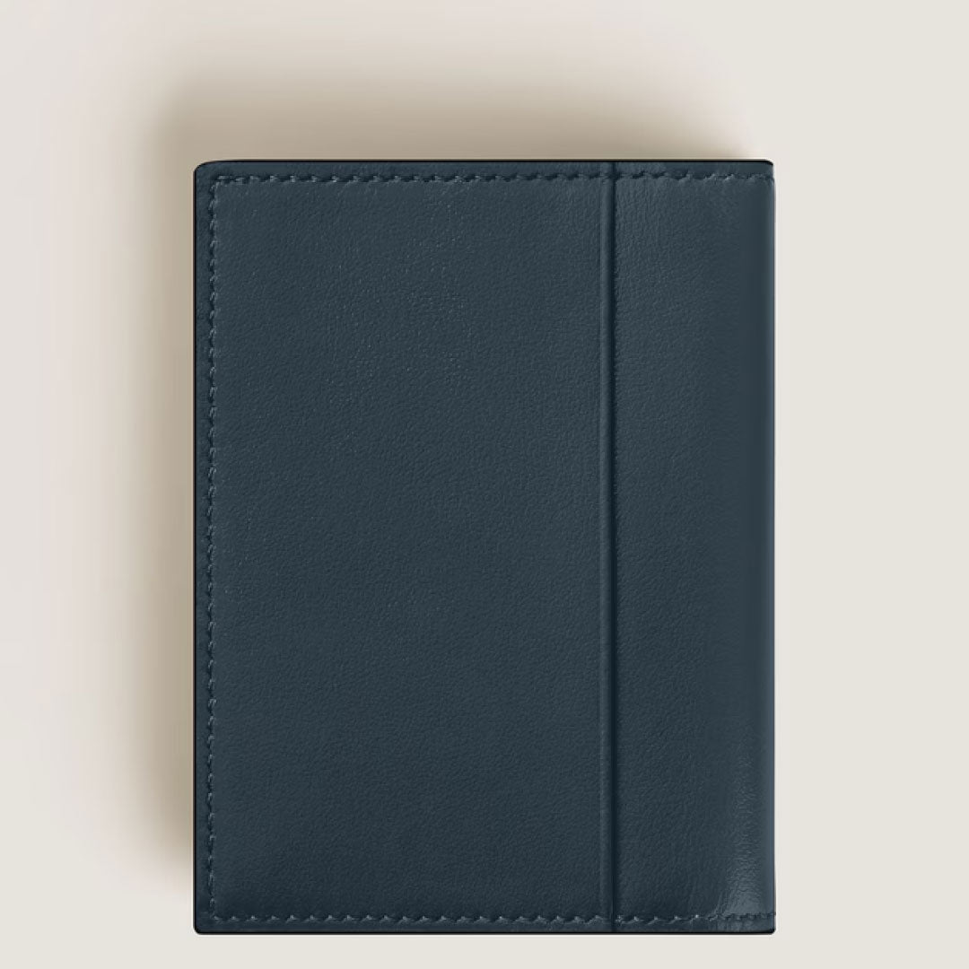 The Montblanc Meisterstuck 4CC Leather Card Holder by Montblanc is a closed, velvet blue calfskin wallet with visible stitching, showcased against a light neutral background.