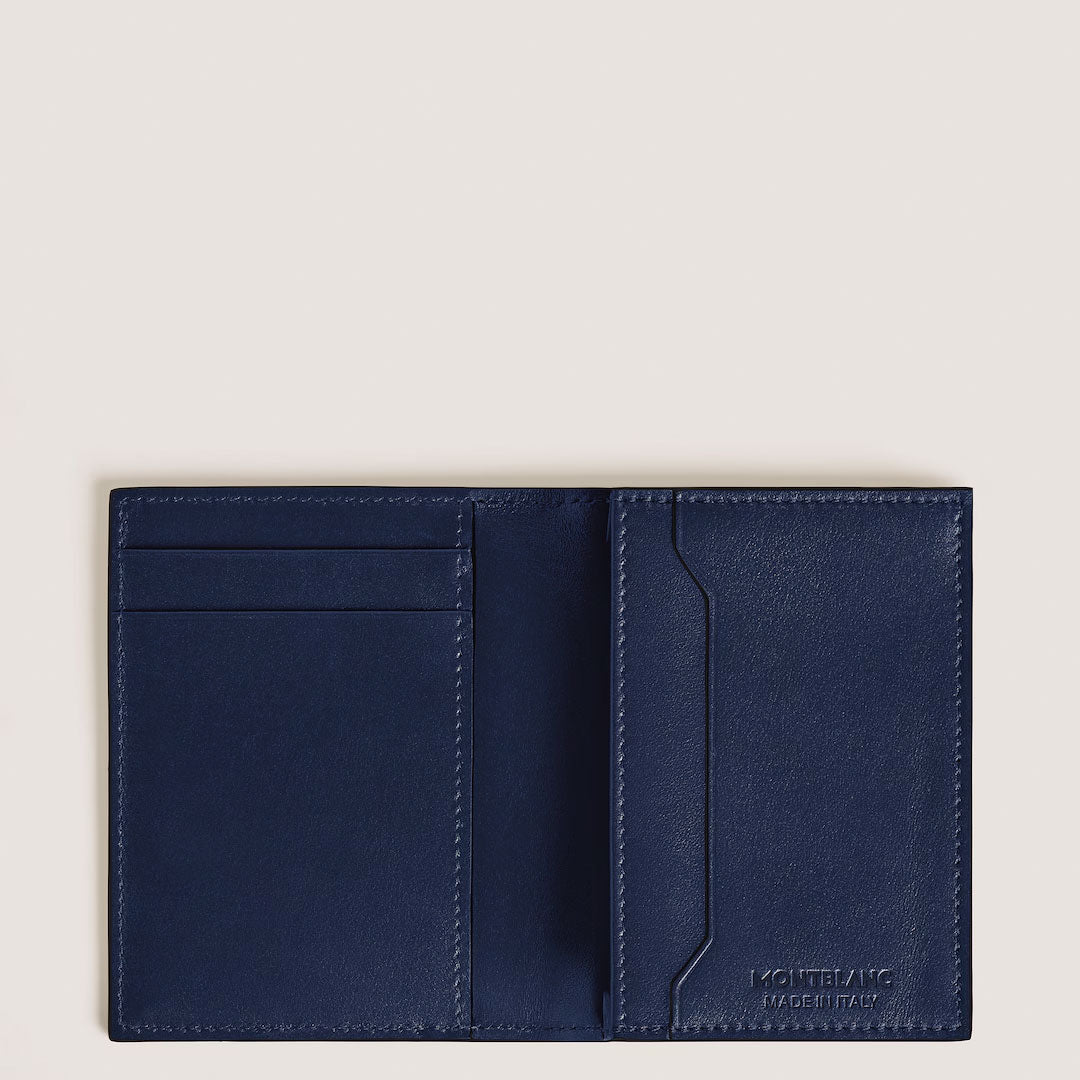 The Montblanc Meisterstuck 4CC Leather Card Holder by Montblanc is open, revealing multiple card slots on the left, a large pocket on the right, neat interior stitching, and "KONTATTO MADE IN ITALY" embossed at the bottom right.