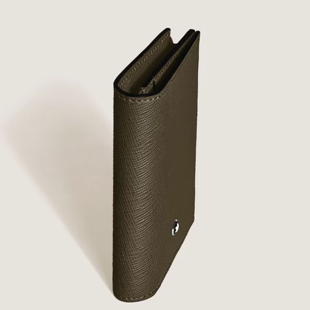 The Montblanc Sartorial 4CC Leather Card Holder stands upright on a light background, partially open to display its interior card holder and credit card slots, with a small round metal Montblanc emblem on the front cover.