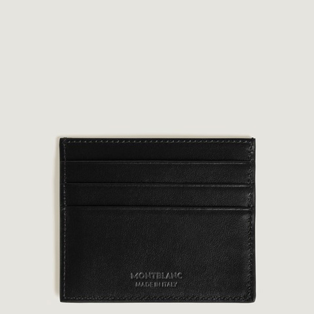 The Montblanc Meisterstuck 6CC Leather Card Holder is crafted in black calfskin, features three horizontal card slots, and has "Montblanc Made in Italy" embossed at the bottom center.