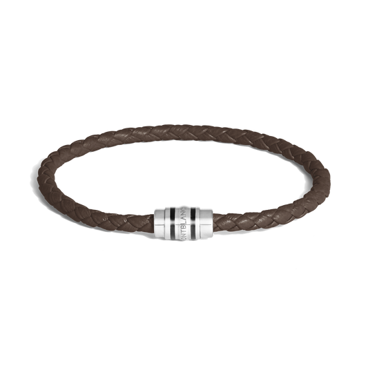 A Montblanc 3 Rings Ebony Grain Leather Bracelet with a textured finish and signature clasp, shown on a white background.